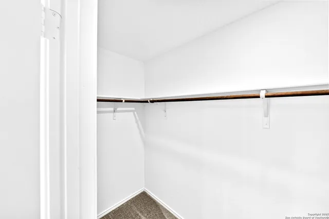 a view of small space with racks on the wall