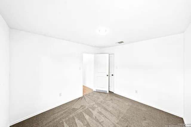 a bathroom with a shower and a shower