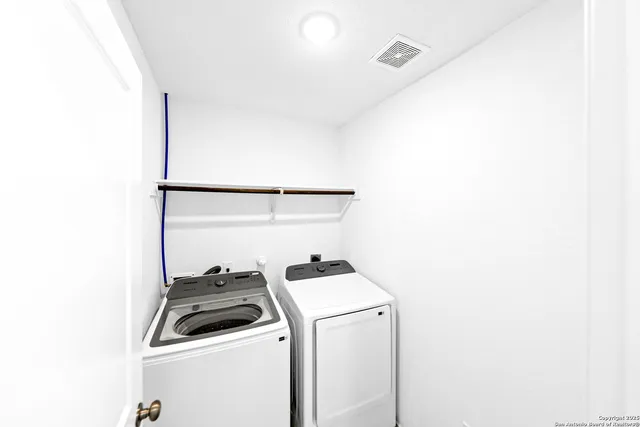 a view of yard with swimming pool and seating area