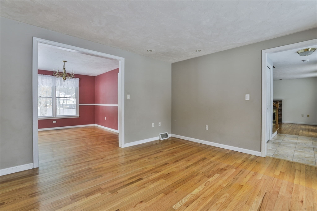 1 Deer Path Lane Mansfield, MA 02048 - Photo 15 of 31 wooden floor in an empty room with a window