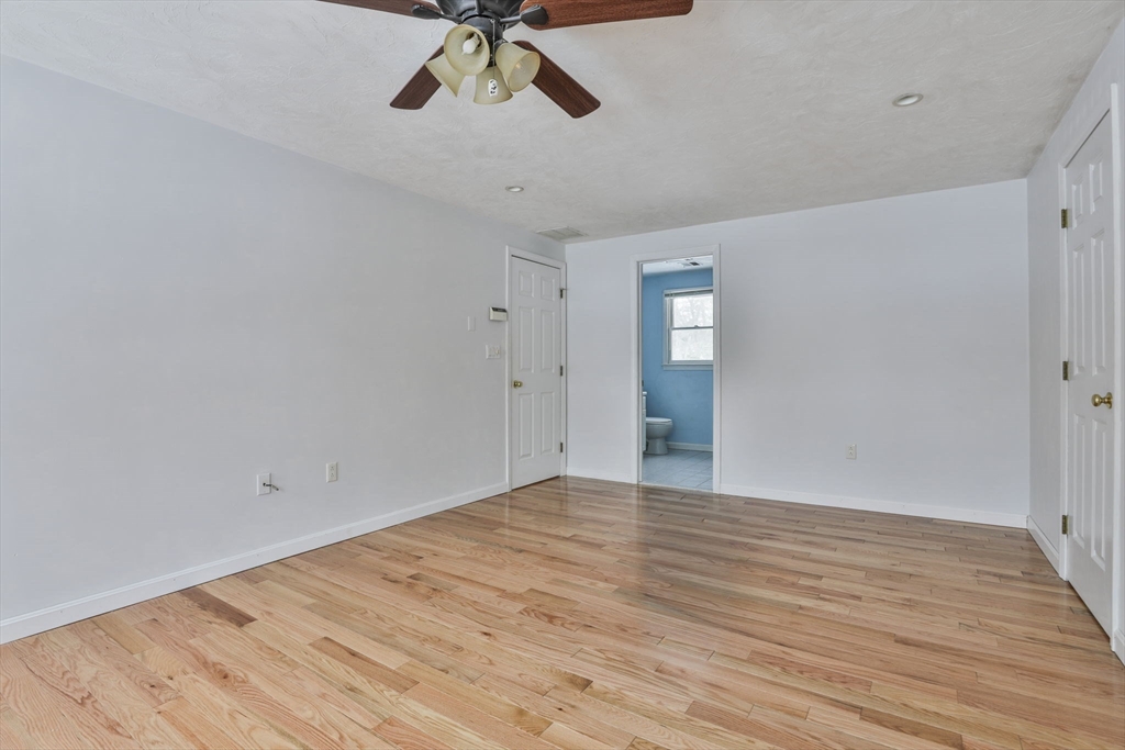 1 Deer Path Lane Mansfield, MA 02048 - Photo 20 of 31 a view of empty room with wooden floor