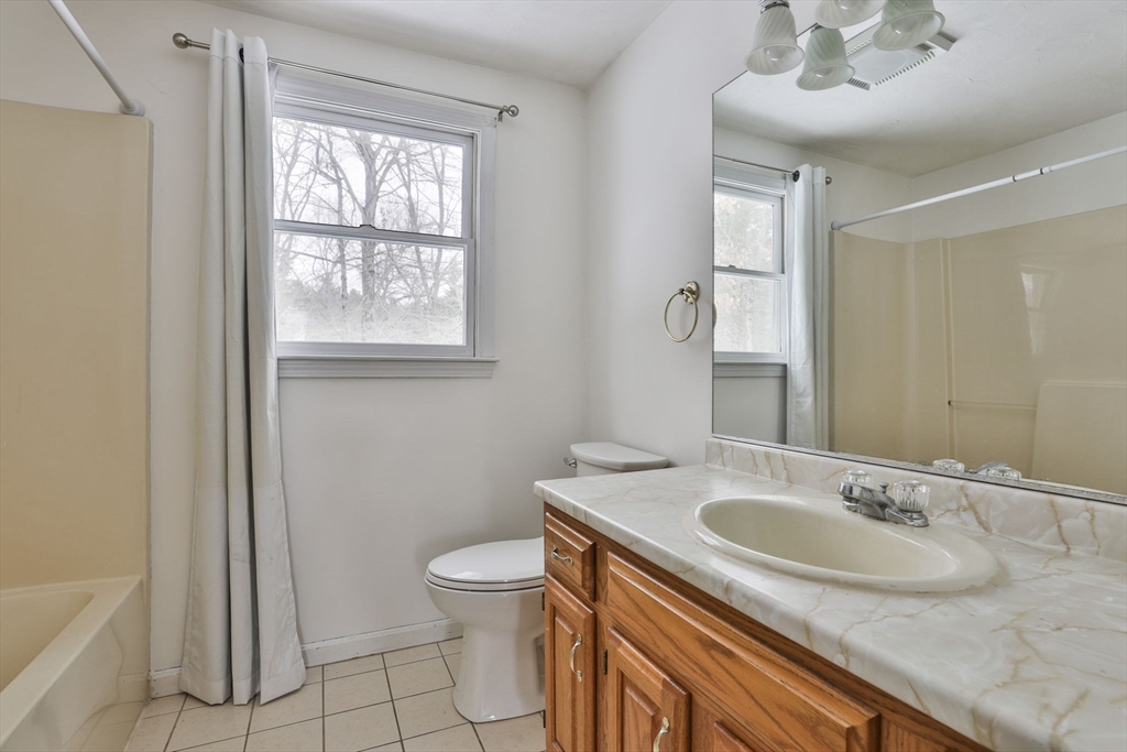 1 Deer Path Lane Mansfield, MA 02048 - Photo 26 of 31 a bathroom with a sink and a toilet