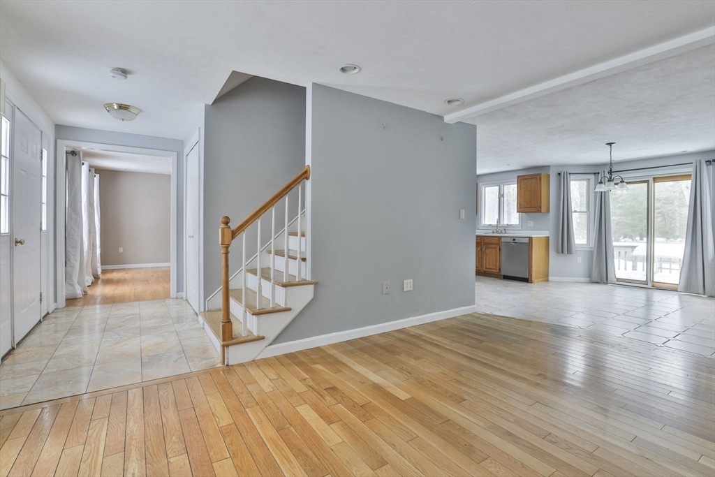 1 Deer Path Lane Mansfield, MA 02048 - Photo 5 of 31 a view of an empty room with window and wooden floor