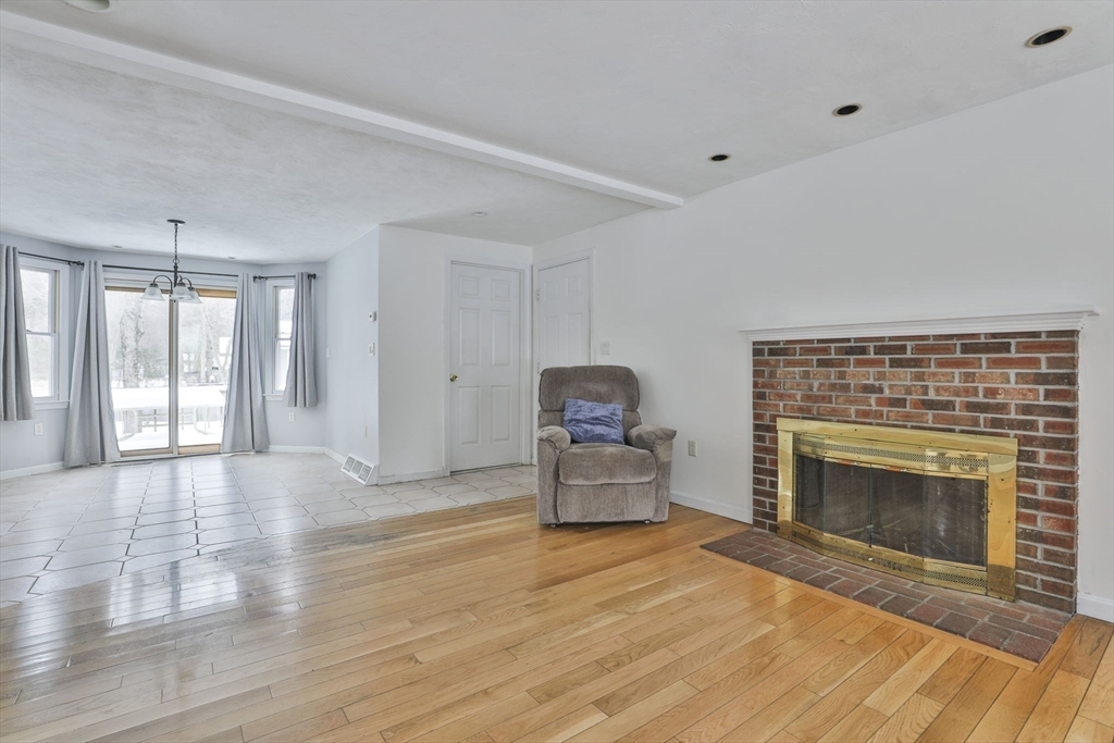 1 Deer Path Lane Mansfield, MA 02048 - Photo 6 of 31 a living room with furniture and a fireplace
