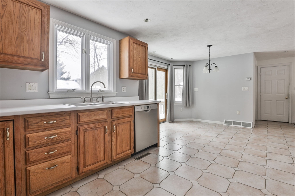 1 Deer Path Lane Mansfield, MA 02048 - Photo 9 of 31 a bathroom with a sink a vanity and a mirror