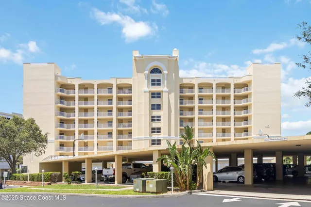 a front view of a building with a street