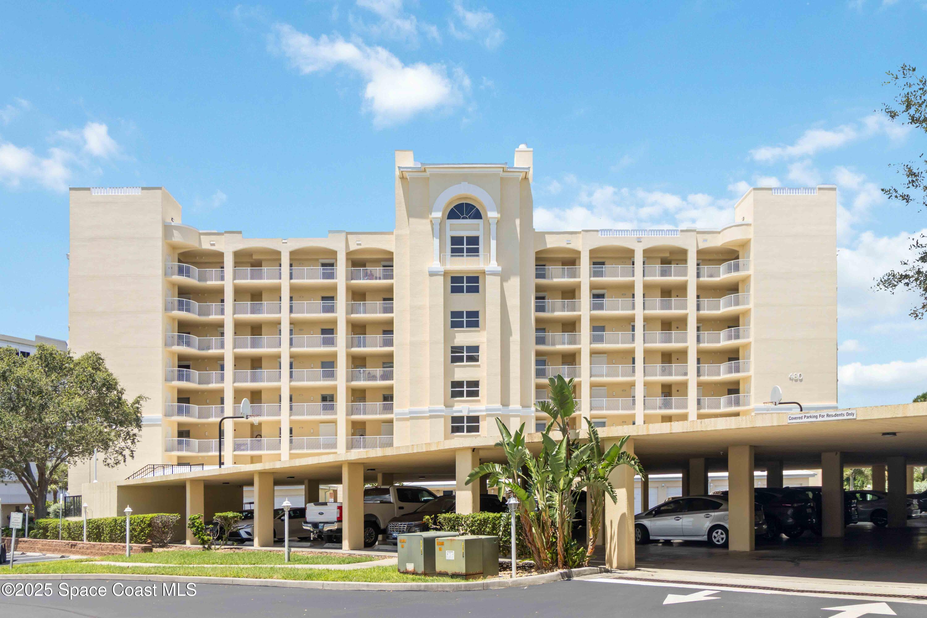 a front view of a building with a street