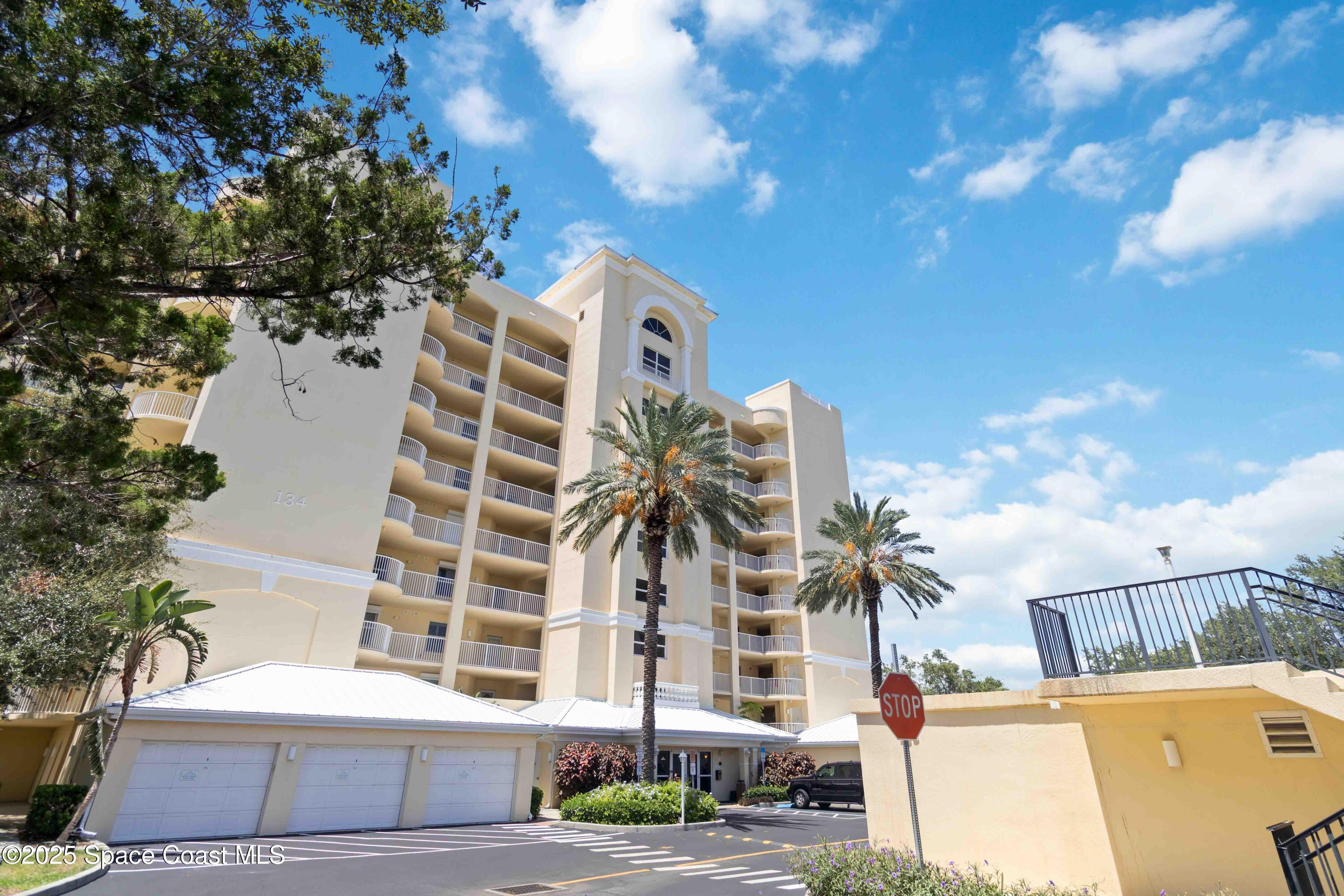 134 Starboard Lane, Unit 404 Merritt Island, FL 32953 - Photo 2 of 30 a front view of a building