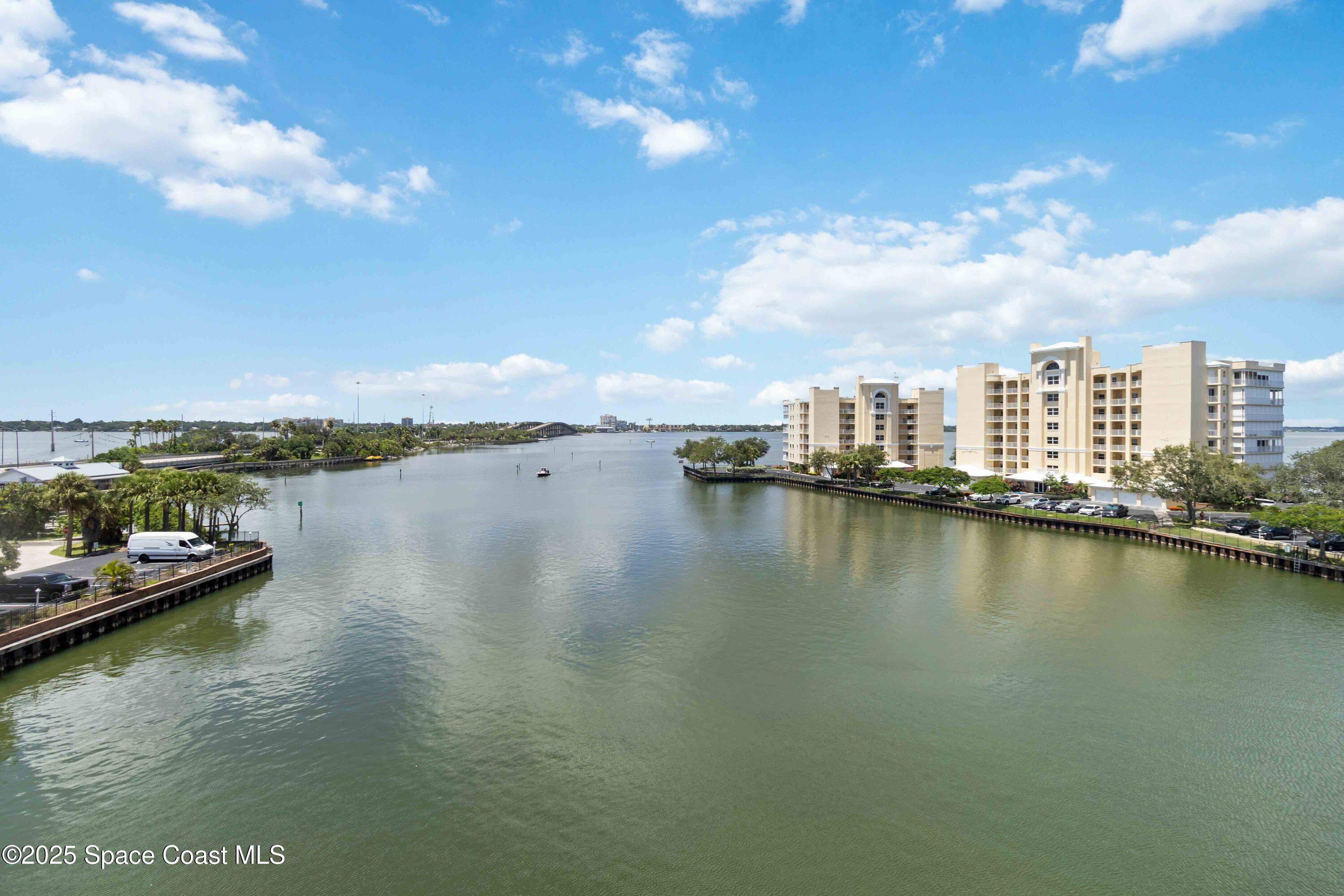 134 Starboard Lane, Unit 404 Merritt Island, FL 32953 - Photo 24 of 30 a view of a city with lake