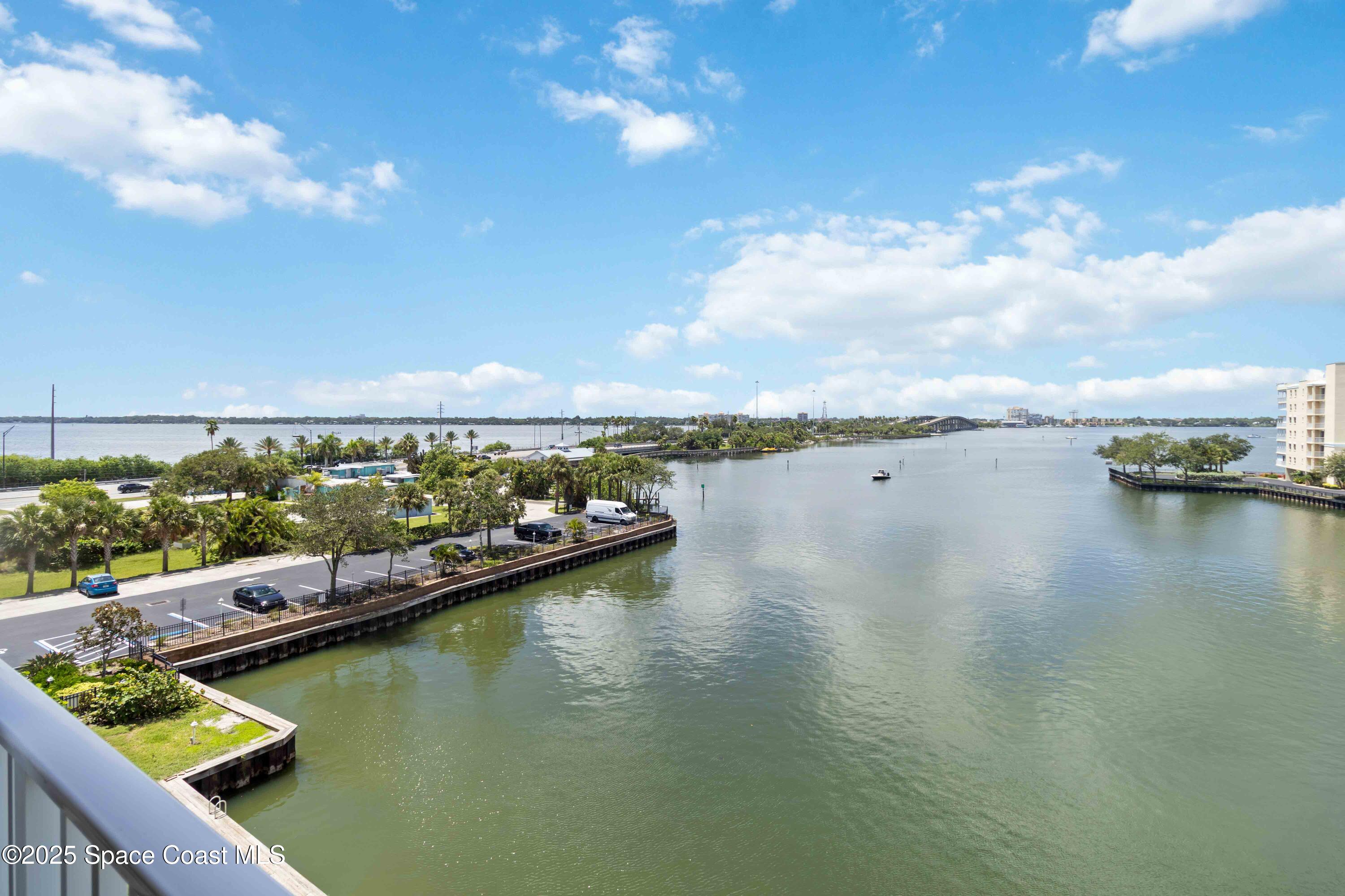 134 Starboard Lane, Unit 404 Merritt Island, FL 32953 - Photo 25 of 30 a view of a water with a large mountain view