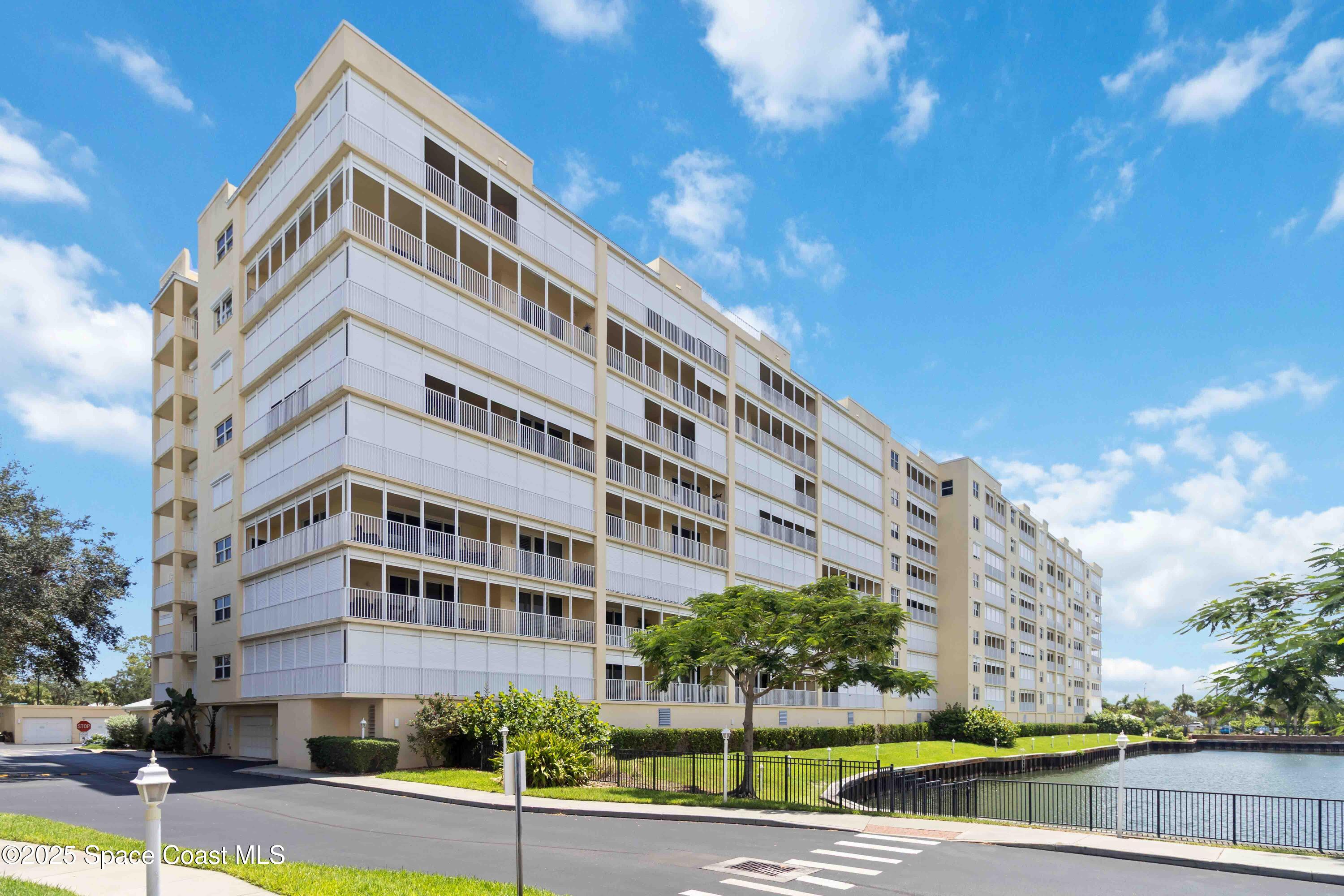 134 Starboard Lane, Unit 404 Merritt Island, FL 32953 - Photo 26 of 30 a front view of a building