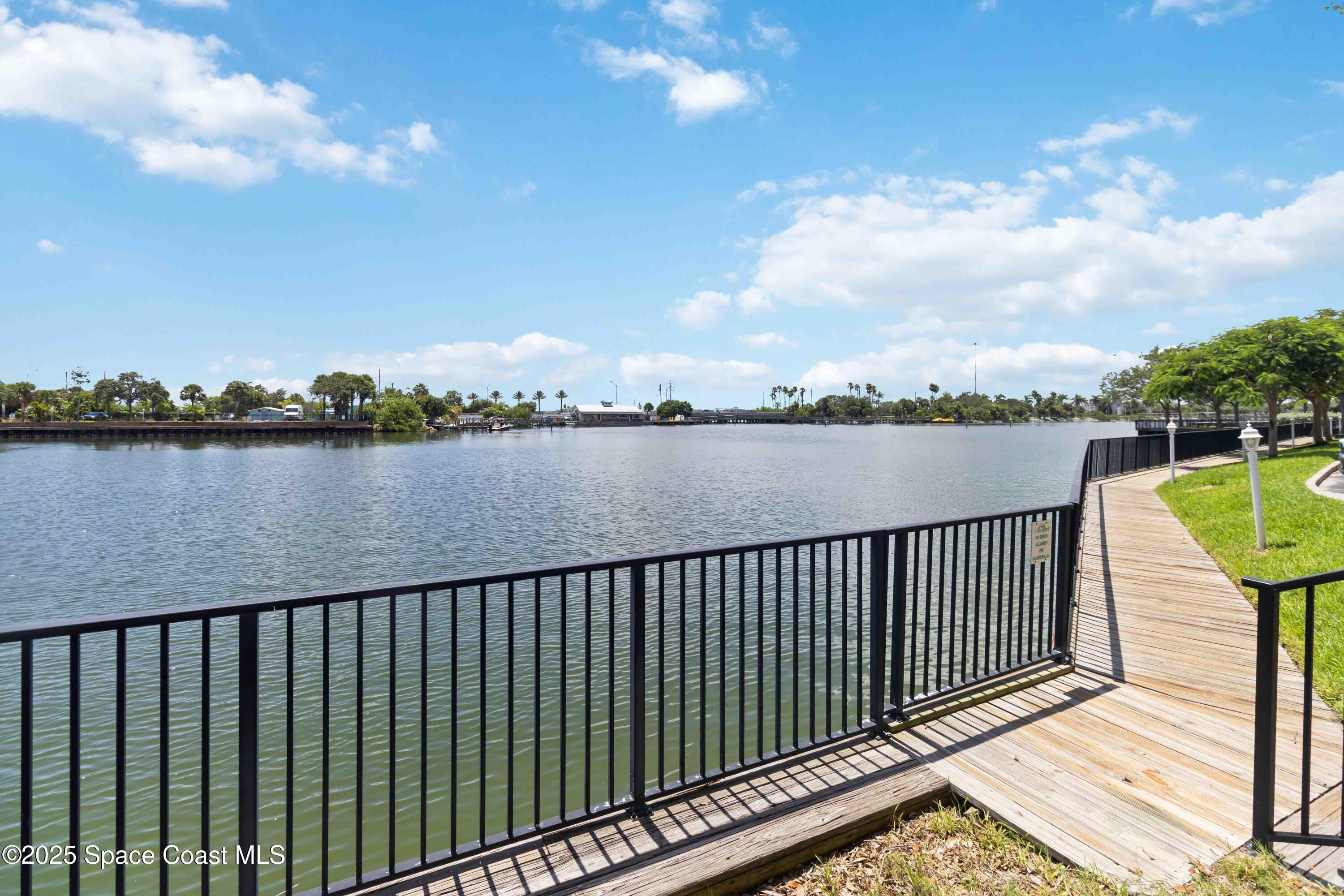 134 Starboard Lane, Unit 404 Merritt Island, FL 32953 - Photo 28 of 30 a deck view with a lake view