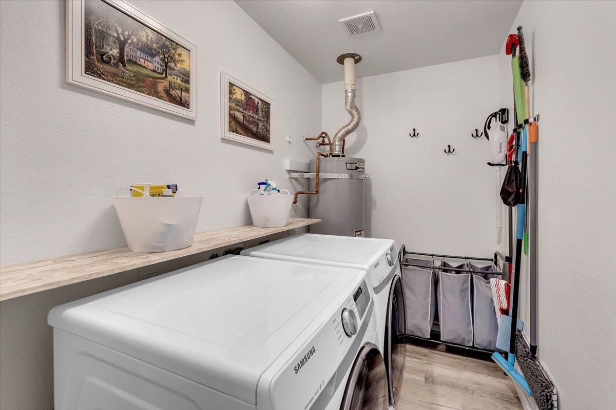 2110 Gentry Way Red Bluff, CA 96080 - Photo 15 of 47 a utility room with dryer and washer