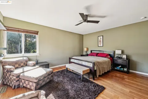 a bathroom with a tub sink and a shower
