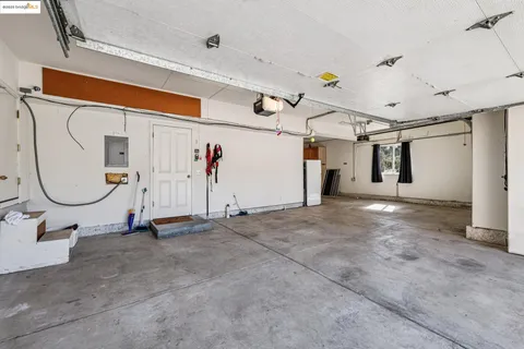 a view of a wooden deck with furniture