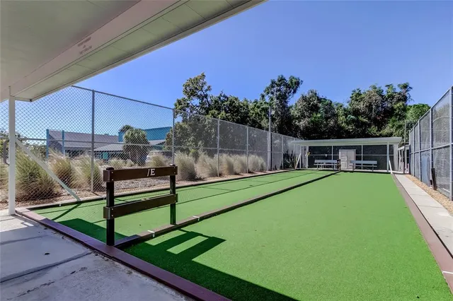 a view of a backyard with sitting area