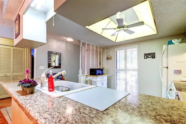a view of a livingroom with furniture and window