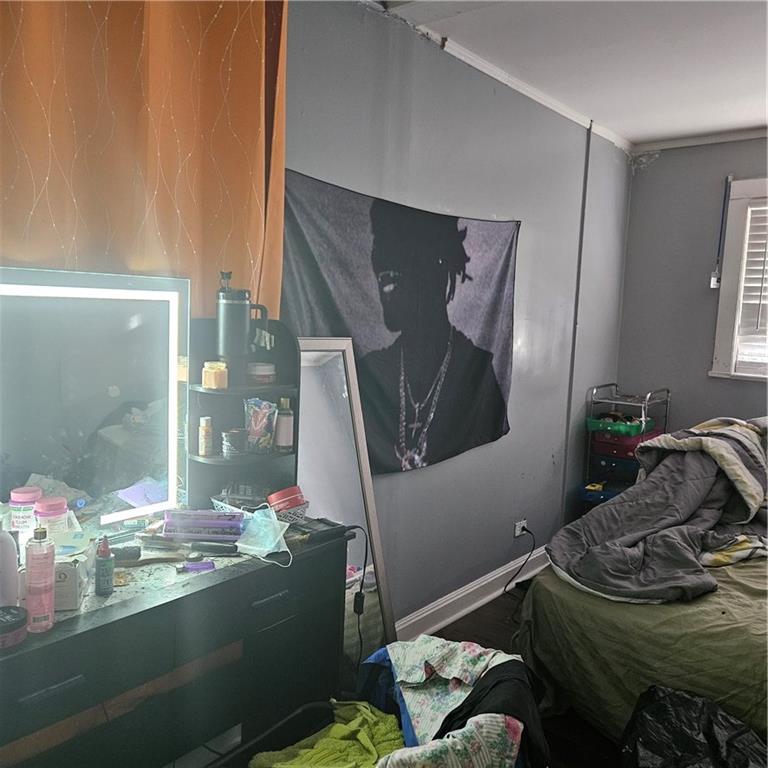 4880 Ben Hill Road Atlanta, GA 30349 - Photo 26 of 48 a room with furniture and window