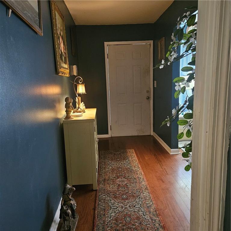 4880 Ben Hill Road Atlanta, GA 30349 - Photo 3 of 48 a view of a house with a hallway