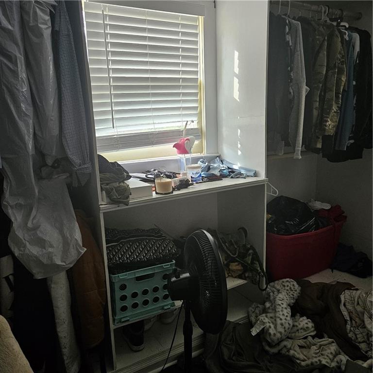 4880 Ben Hill Road Atlanta, GA 30349 - Photo 31 of 48 a room with furniture and wooden floor