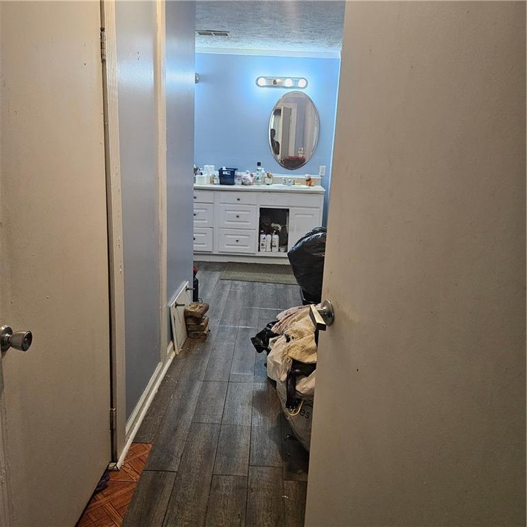 4880 Ben Hill Road Atlanta, GA 30349 - Photo 34 of 48 a view of dining room with wooden floor