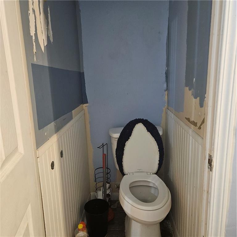 4880 Ben Hill Road Atlanta, GA 30349 - Photo 36 of 48 a bathroom with a toilet and a sink