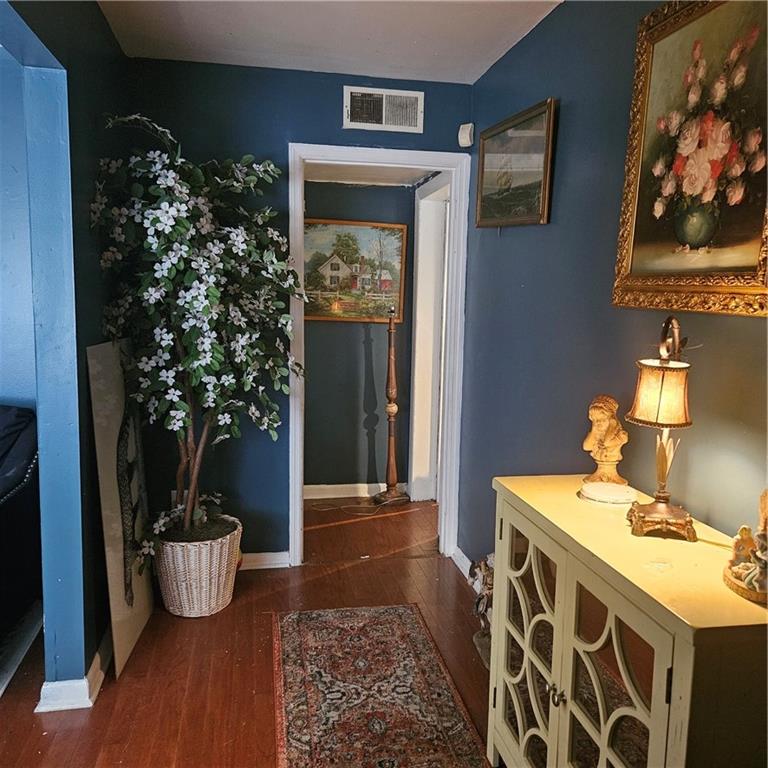 4880 Ben Hill Road Atlanta, GA 30349 - Photo 7 of 48 a bathroom with a sink and a mirror