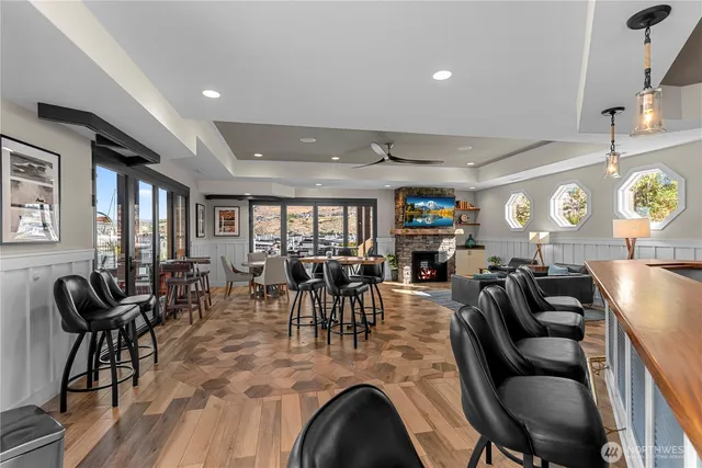 a kitchen with stainless steel appliances granite countertop a refrigerator and microwave