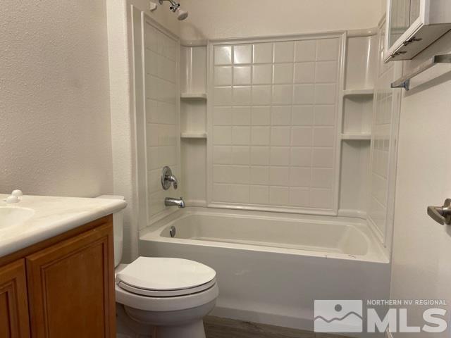 1416 Lambrays Lane Sparks, NV 89436 - Photo 12 of 12 a bathroom with a sink a toilet and a bathtub