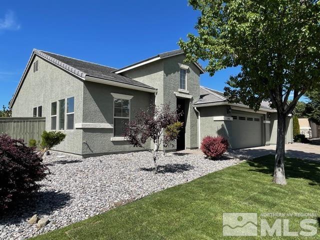 1416 Lambrays Lane Sparks, NV 89436 - Photo 2 of 12 a view of a house with backyard