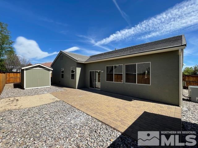 1416 Lambrays Lane Sparks, NV 89436 - Photo 3 of 12 a front view of a house with a yard