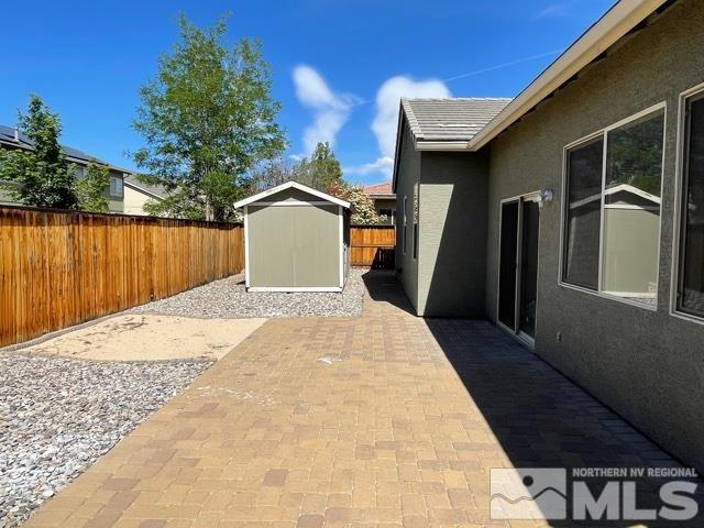 1416 Lambrays Lane Sparks, NV 89436 - Photo 4 of 12 a front view of a house with a space