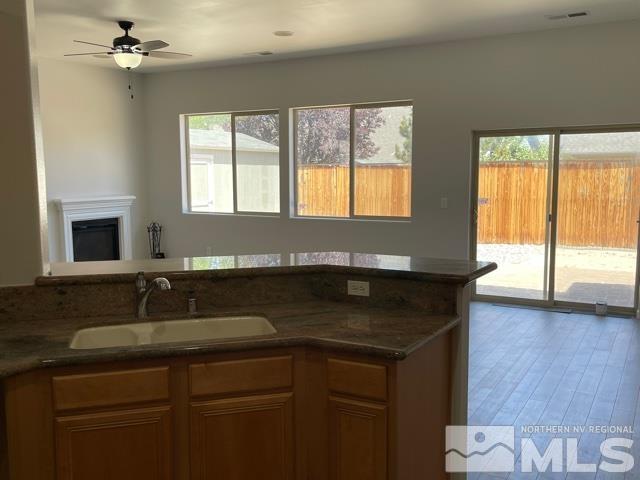 1416 Lambrays Lane Sparks, NV 89436 - Photo 8 of 12 a kitchen with a sink and large window