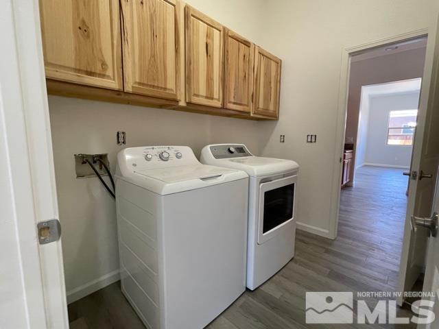 1416 Lambrays Lane Sparks, NV 89436 - Photo 10 of 12 a utility room with wooden floor washer dryer and cabinets