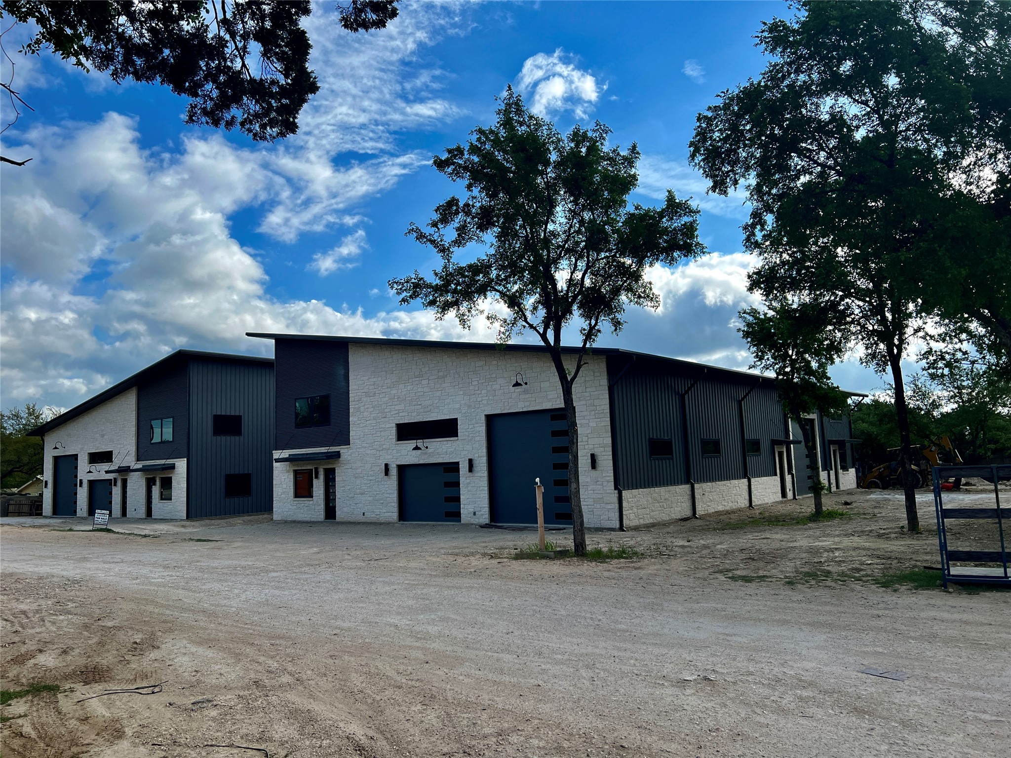 2203 Pyramid Drive Austin, TX 78734 - Photo 11 of 11 a view of a house with a backyard and a tree