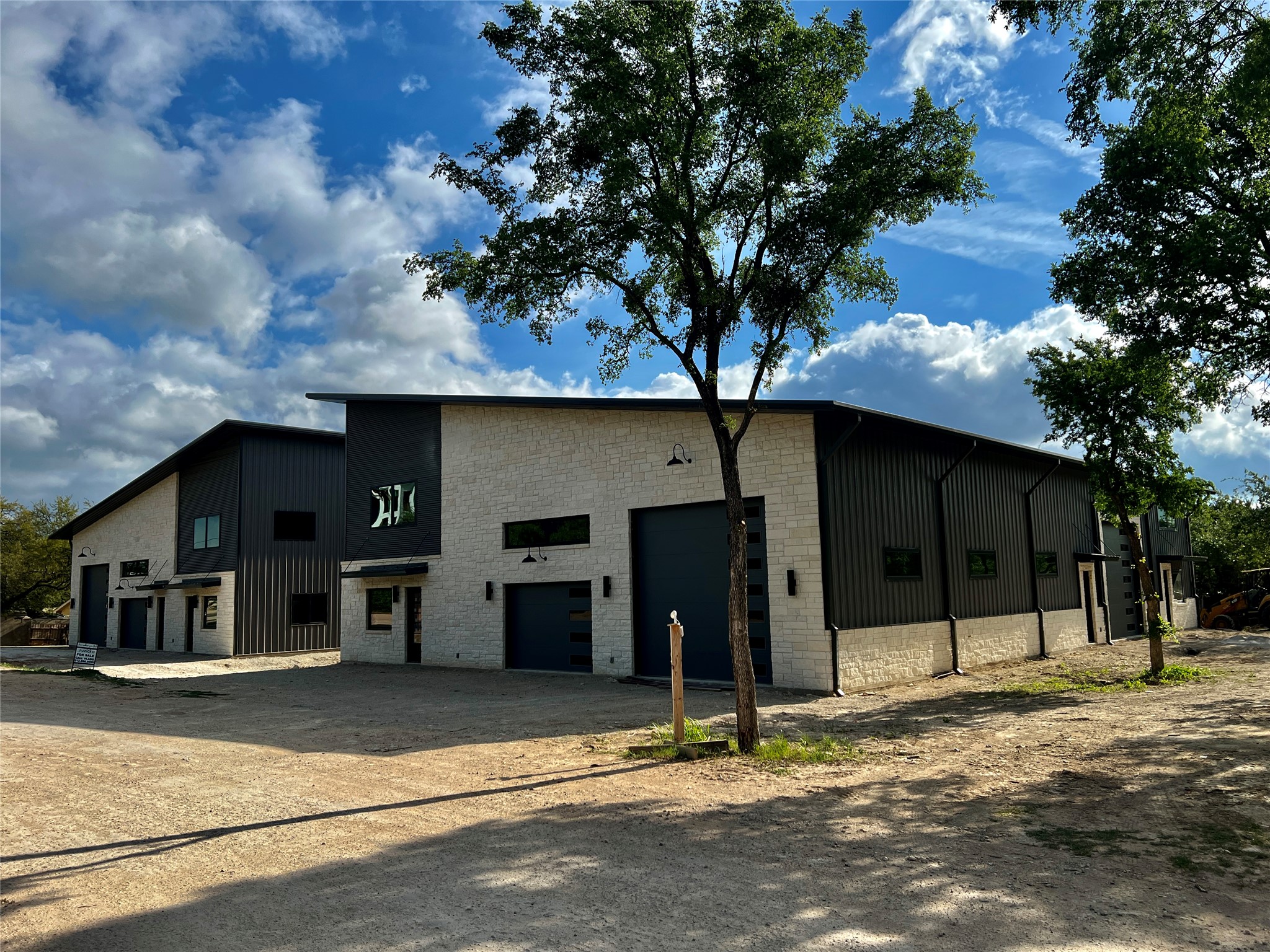2203 Pyramid Drive Austin, TX 78734 - Photo 2 of 11 a house with trees in the background