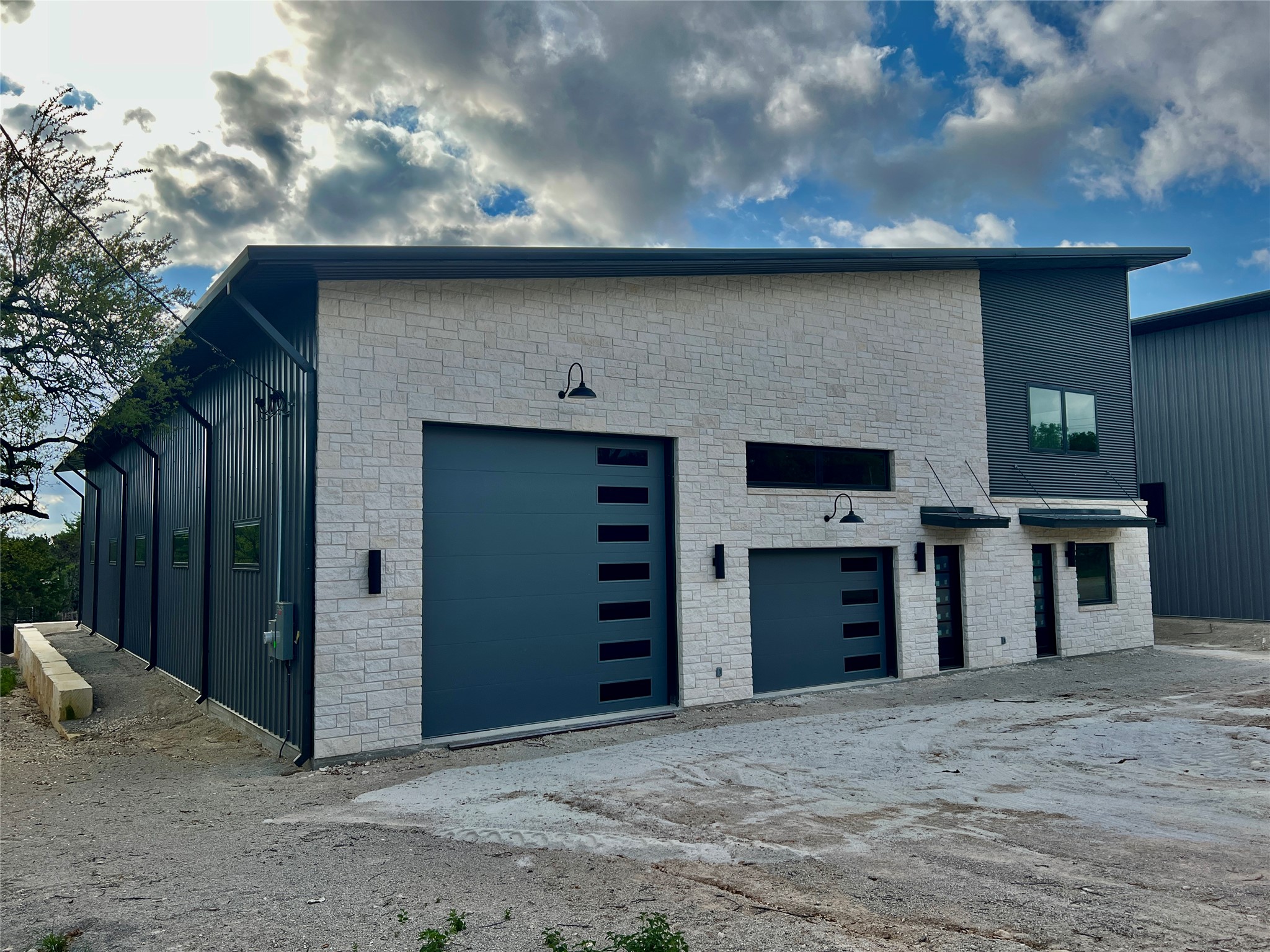 2203 Pyramid Drive Austin, TX 78734 - Photo 3 of 11 a front view of a house with a yard