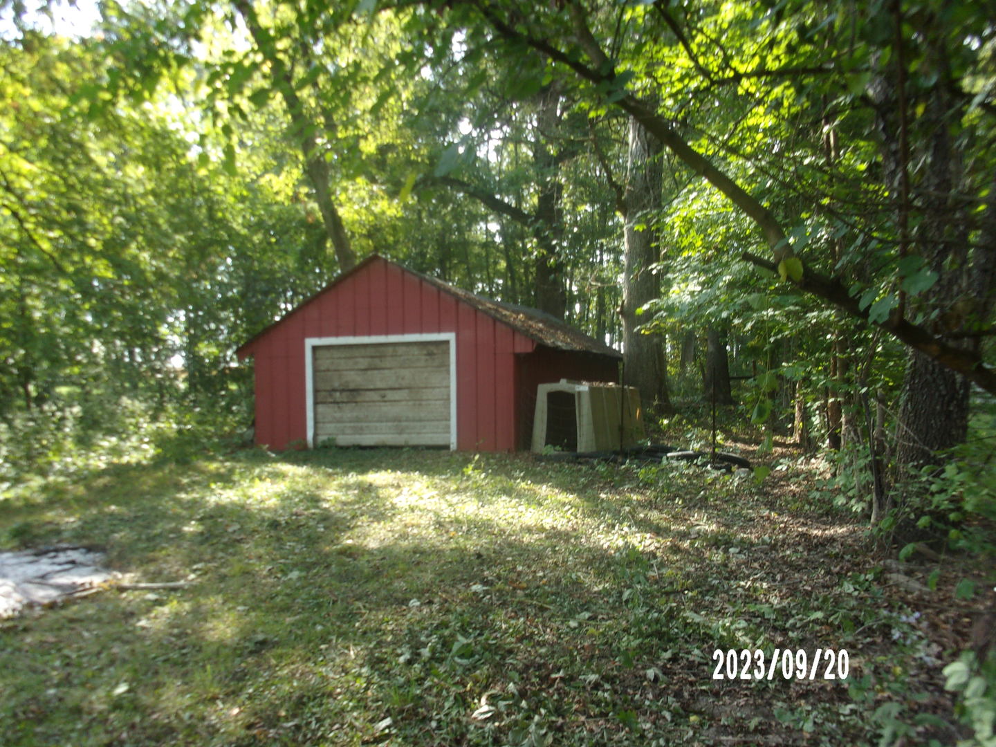 2788 East Twp 121 Road Sheldon, IL 60966 - Photo 11 of 12 a house is sitting in middle of forest