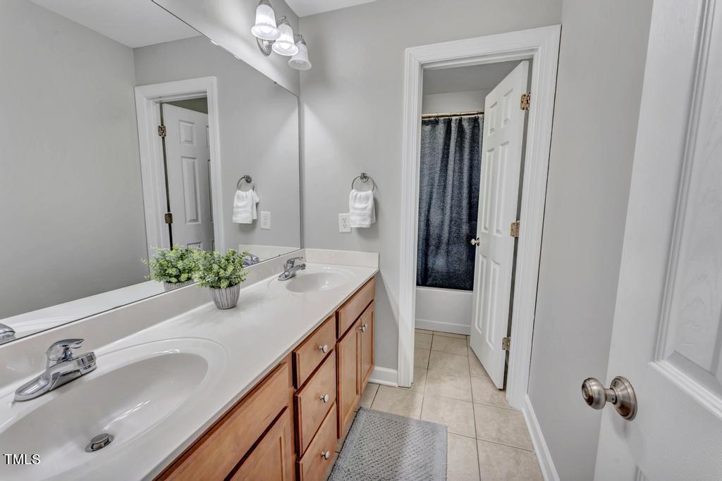 1505 Struble Circle Willow Spring, NC 27592 - Photo 24 of 32 Hall Bath w/ Dual Vanity