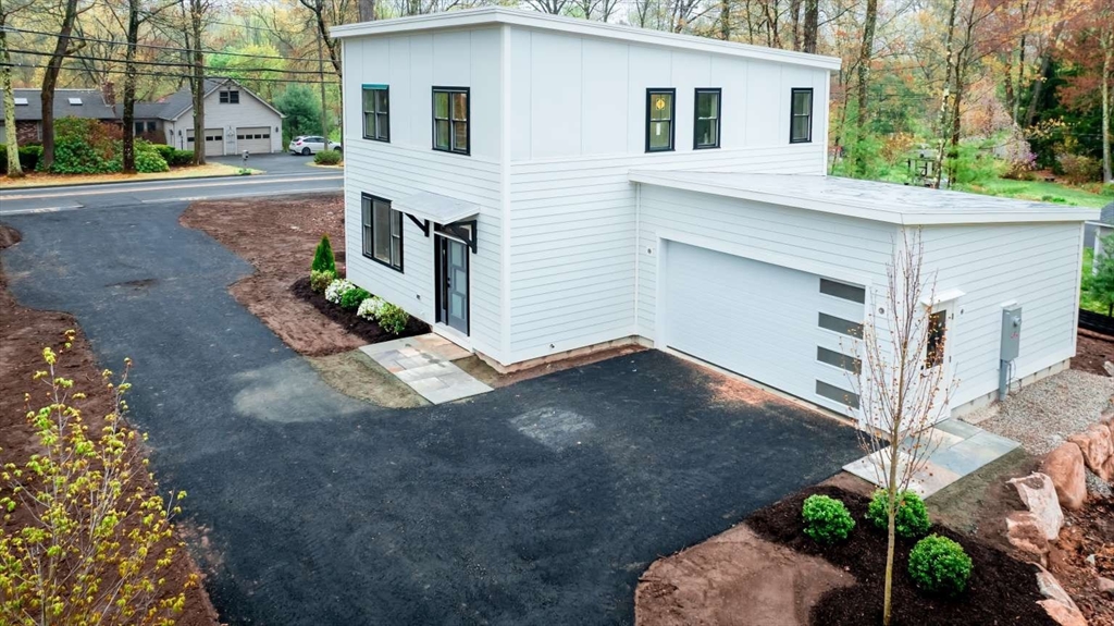 811 Burts Pit Road Northampton, MA 01062 - Photo 3 of 10 a view of a house with a yard and potted plants