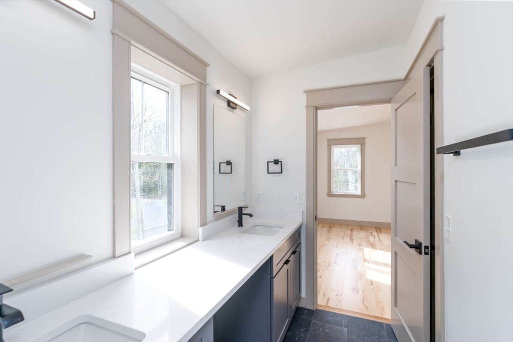 811 Burts Pit Road Northampton, MA 01062 - Photo 8 of 10 a spacious bathroom with a shower and a sink