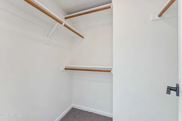 a view of a dining room and a table or chandelier