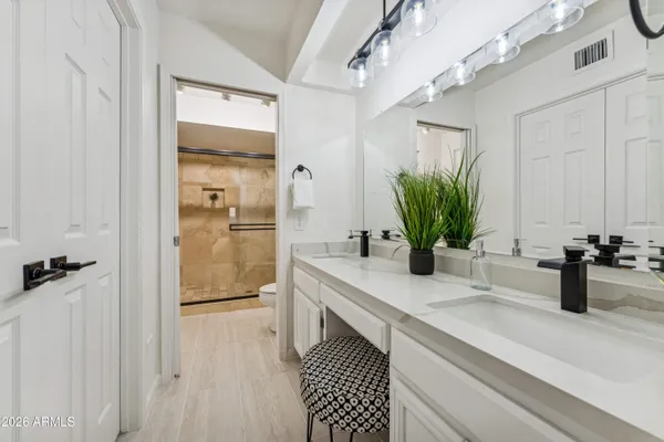 a view of empty room with windows