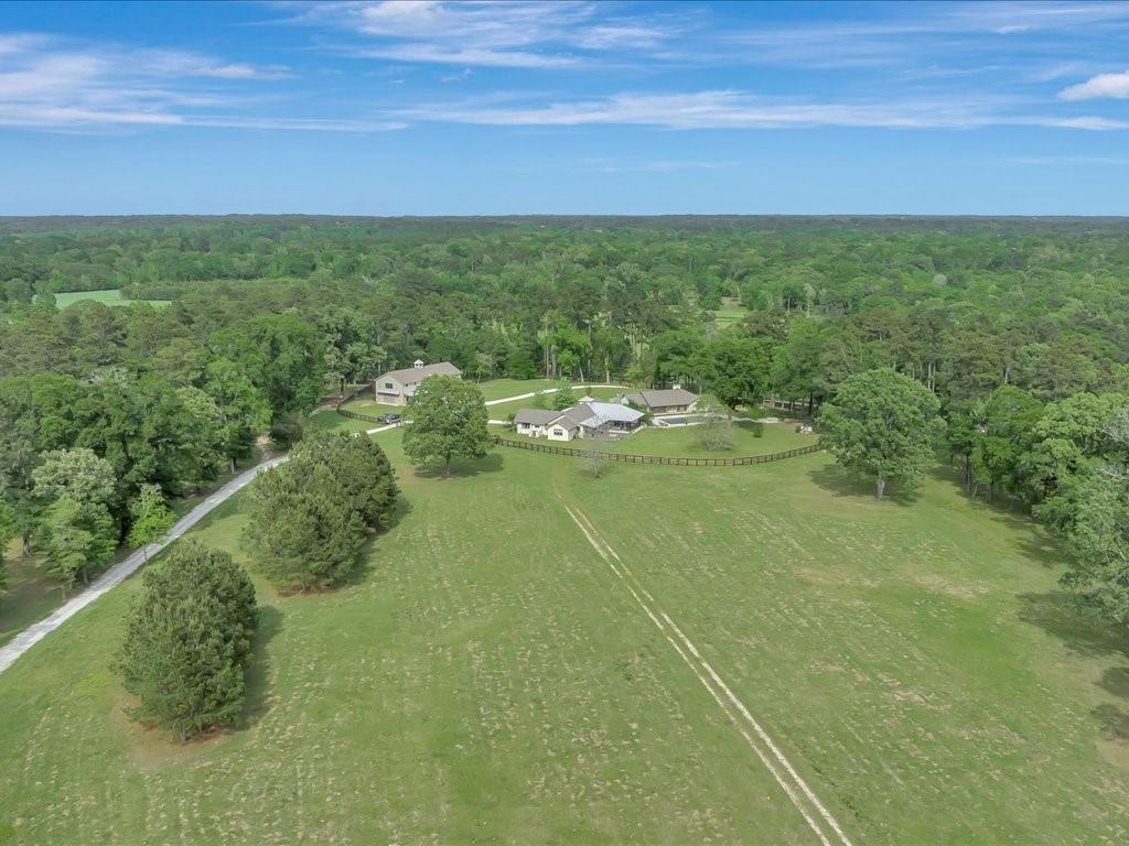 a view of a field with an outdoor space