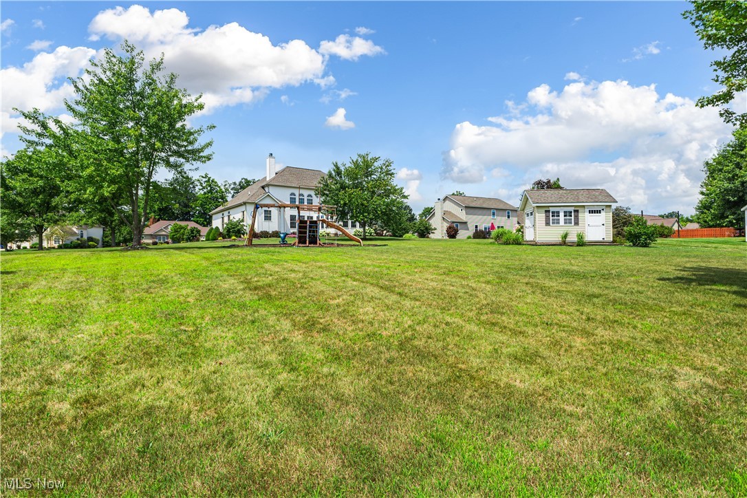2251 Timber Ridge Trail Streetsboro, OH 44241 - Photo 13 of 48 View of yard featuring a playground