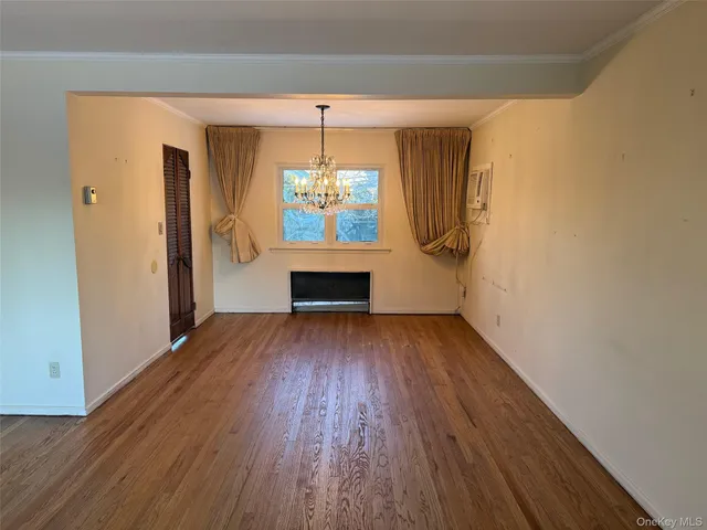 a view of livingroom with hardwood floor and a ceiling fan