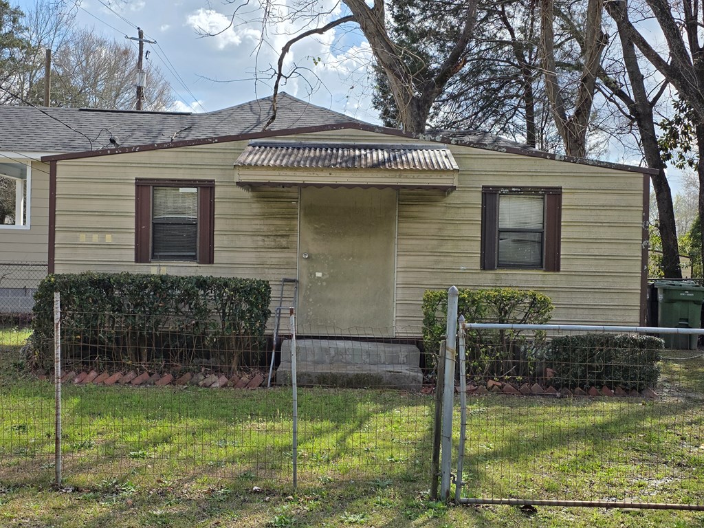 1352 24th Street Columbus, GA 31901 - Photo 14 of 18 a front view of a house with garden