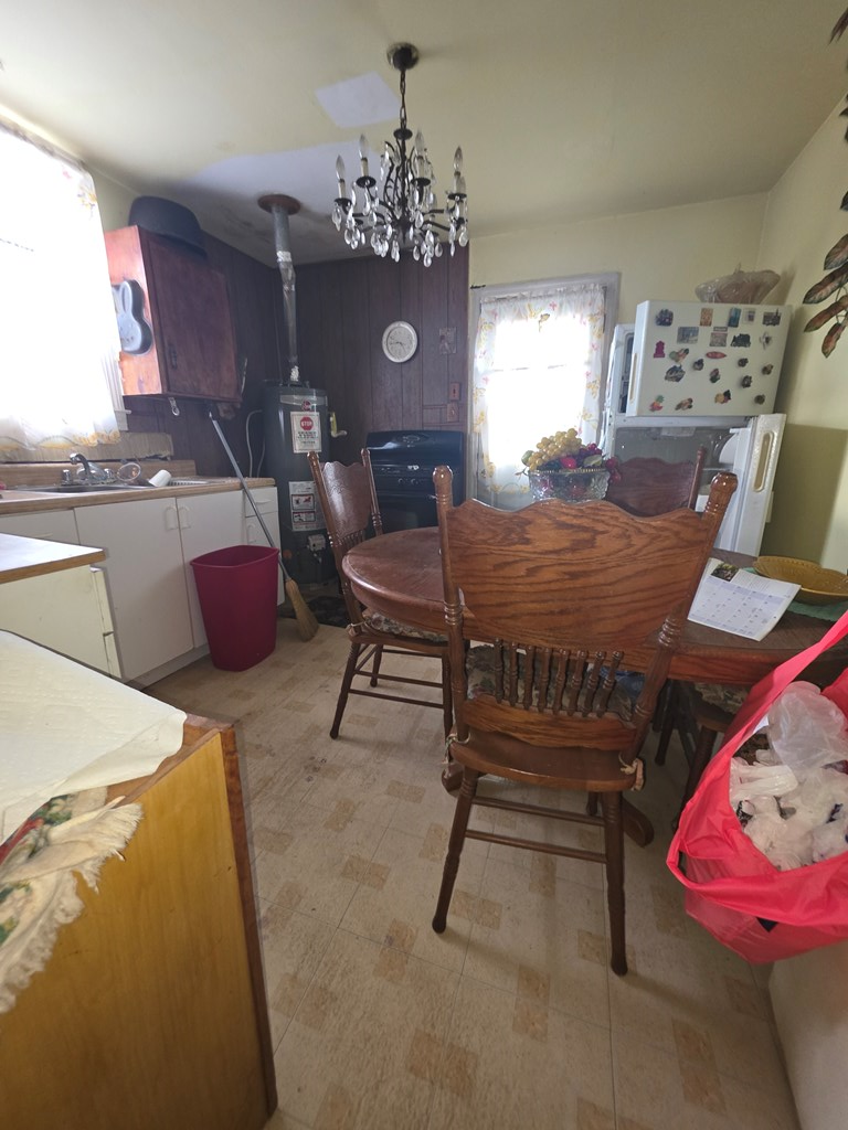 1352 24th Street Columbus, GA 31901 - Photo 10 of 18 a dining room with furniture and window