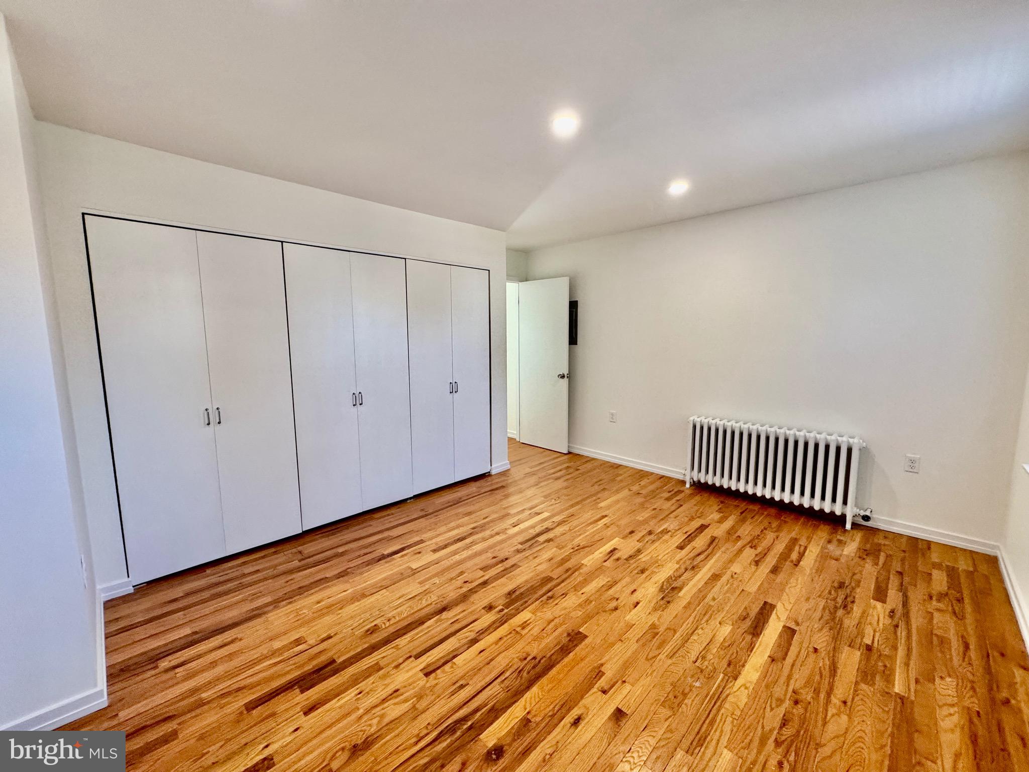 2148 Green Street, Unit 2 Philadelphia, PA 19130 - Photo 13 of 27 a view of a room with wooden floor