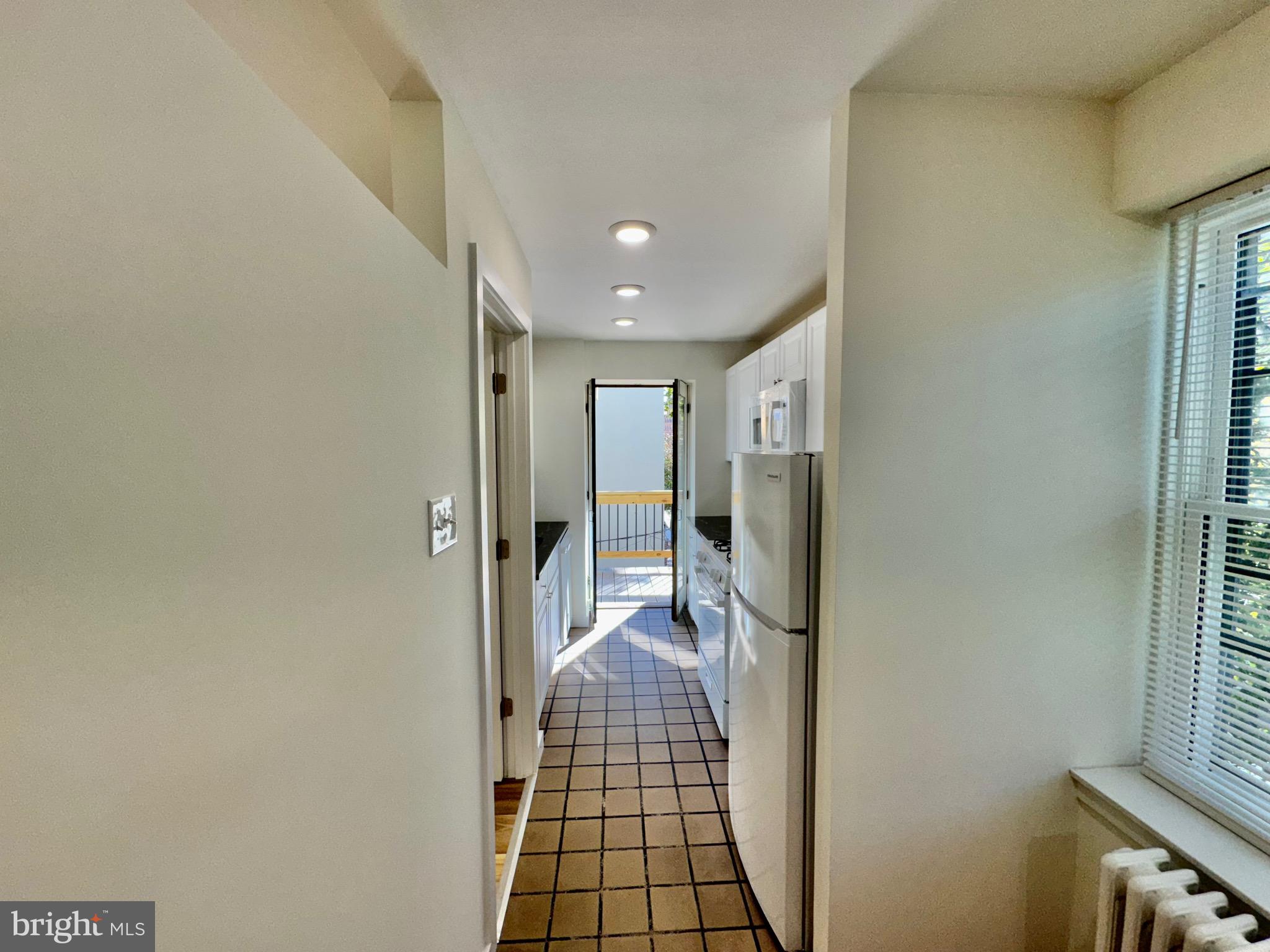 2148 Green Street, Unit 2 Philadelphia, PA 19130 - Photo 21 of 27 a bathroom with a glass door shower